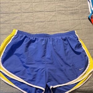 Nike Women's Athletic Shorts in Blue with Yellow Trim
